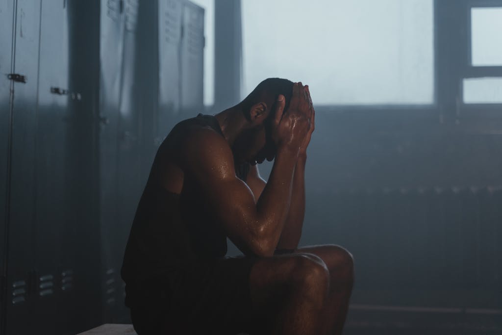 Athlete preparing mentally before a game while dealing with sports performance anxiety